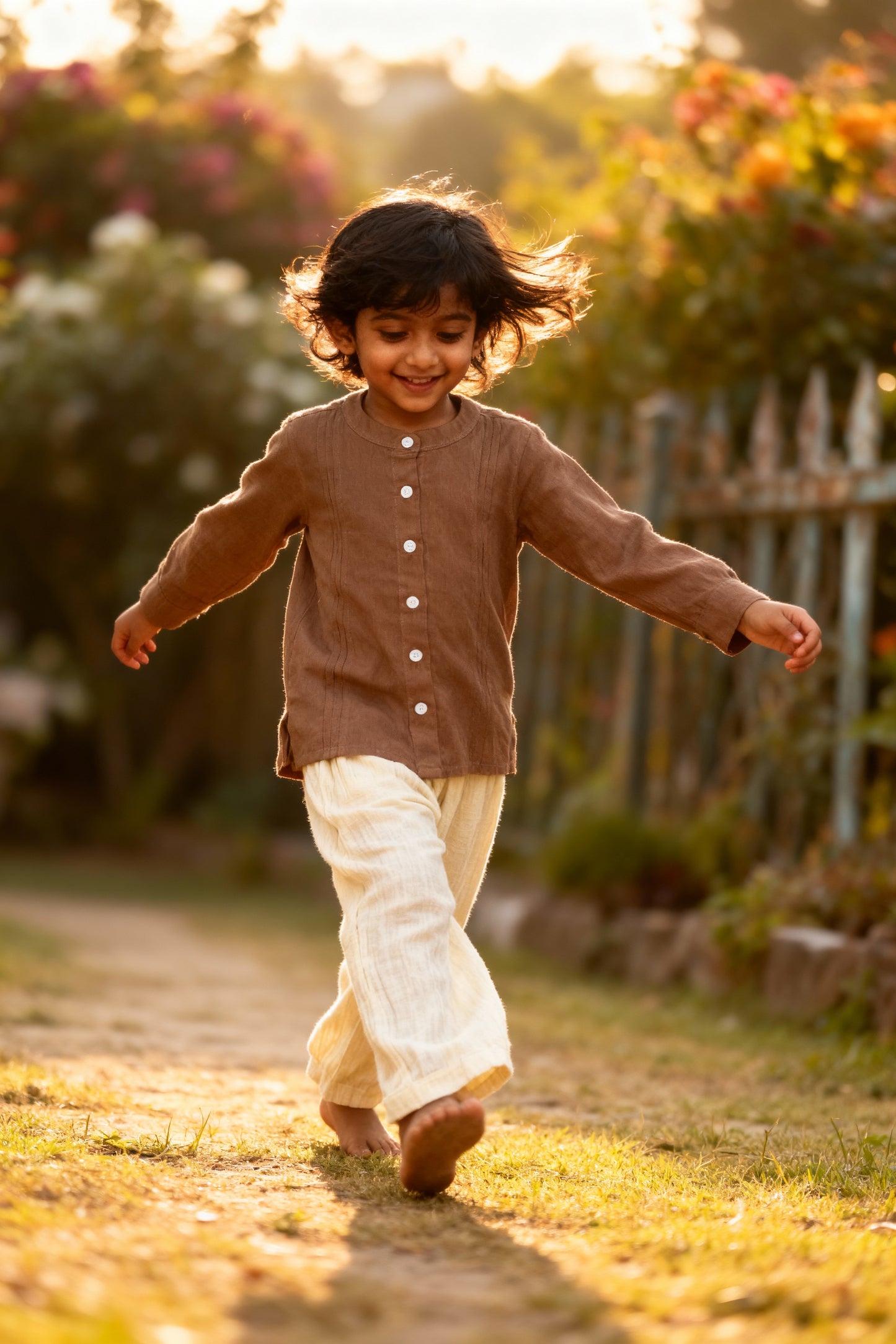 Petra organic cotton-linen kids shirt back view showing natural corozo buttons and relaxed fit